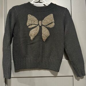 Black Sweater with Gold Bow Accent